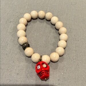 Beaded Bracelet with Red Skull Charm